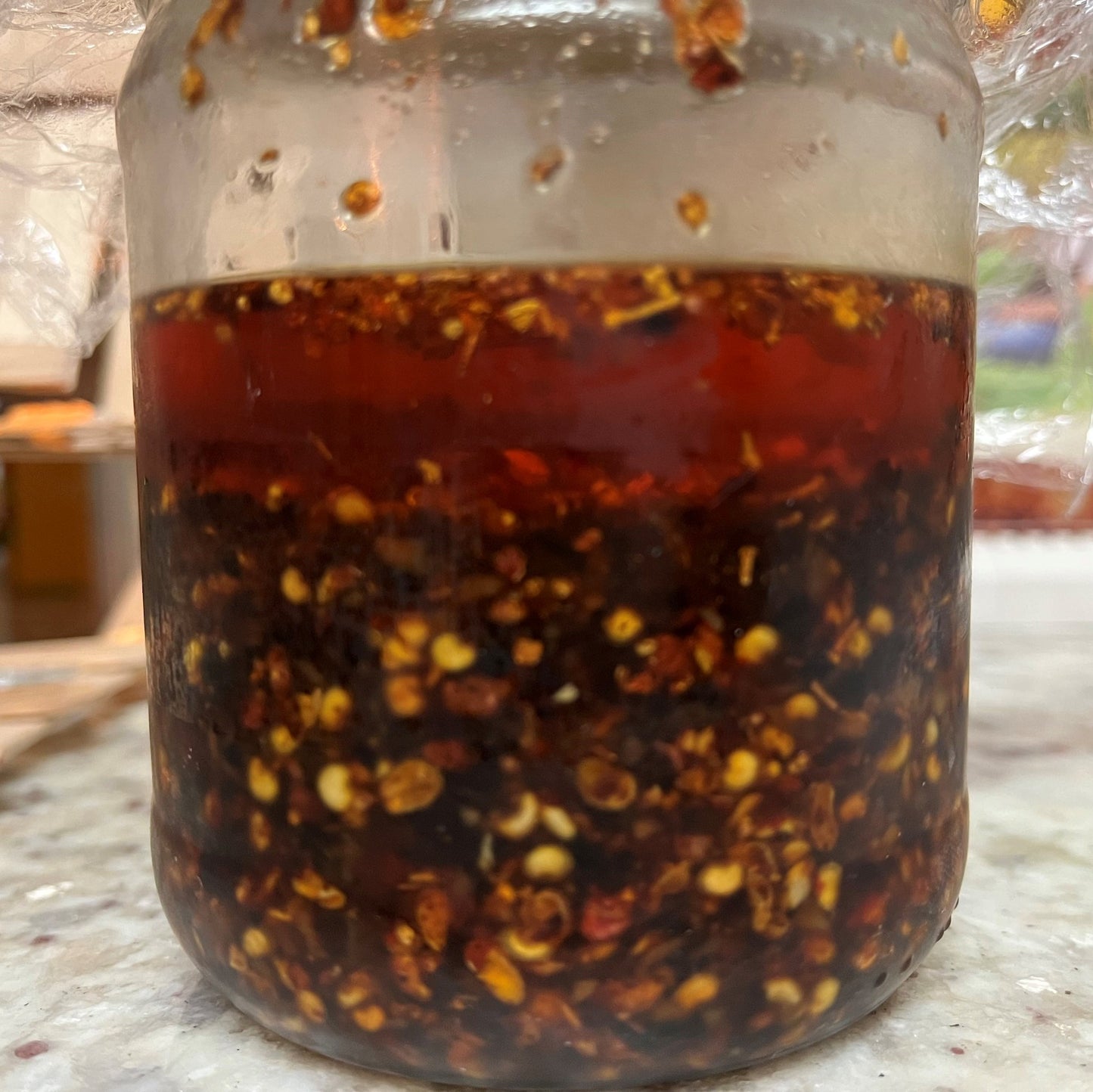 Starry Kitchen Chili *bomb* sauce. Medium Asian (read: actually) Spicy. Great on it's own or mixed with Lao Gan Ma or Fly by Jing